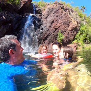Family enjoying a swim at Wangi Falls in Litchfield National Park